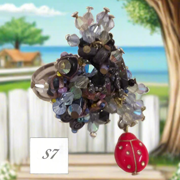 azzurro nero coccinella rossa shop anelli fatti a mano bigiotteria di perline perle pietre intrecciati bijoux  con filo e basi cristalli Swarovski componenti di murano