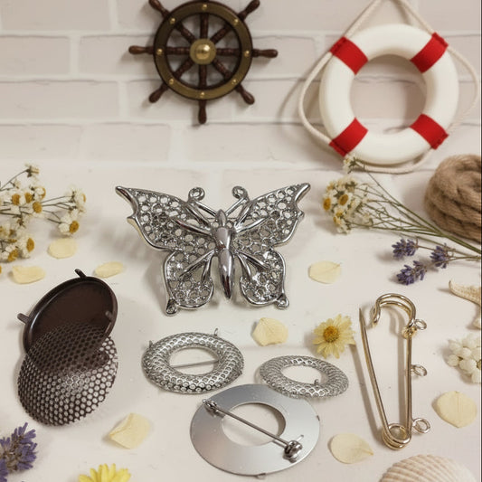 negozio online vendita basi per spille fai da te bigiotteria creare perline charms ciondoli metallo rame argento bottoni con ago spilloni con anellino forma farfalla