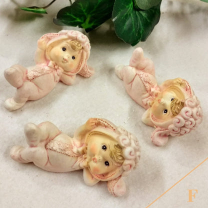 bimbe pigiamino rosa shop online negozio ricordini oggettini regalini bomboniere baby shower nascita Battesimo assortimento rosa bianco