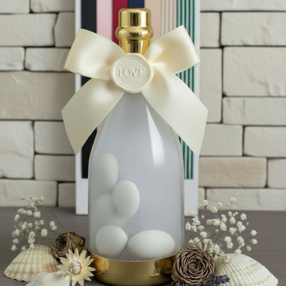 simbolo love ceralacca bottiglia plastica tappo oro fiocco panna nastro bomboniere matrimonio nozze confezionate confetti tulle allestimento fiori secchi