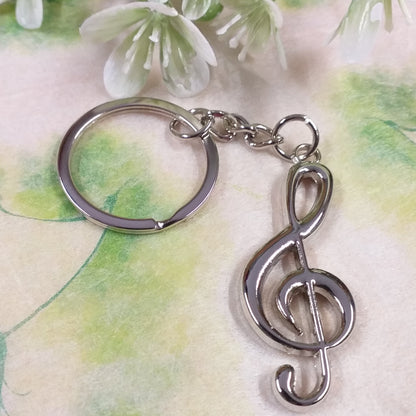 anello e catenina gadget per compleanno comunione cresima composizione con portachiavi metallo ciondolo chiave di violino sol bomboniere musica conservatorio