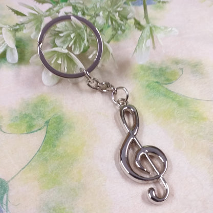 gadget per compleanno comunione cresima composizione con portachiavi metallo ciondolo chiave di violino sol bomboniere musica conservatorio