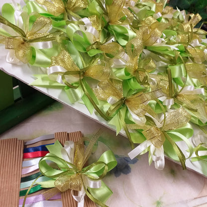 vassoio vetrina verde oro anniversario matrimonio nozze d'oro cinquantesimo 50 anni per coccarde fiocchi pronti fai da te bomboniere confezionare scatole packaging confezioni pacchi regalo nastrini colorati dorati