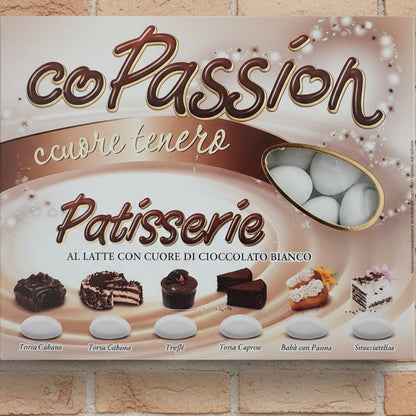 ciocopassion Crispo il confetto dal cuore tenero mix patisserie cioccolato al latte e cioccolato bianco gusto pasticceria torta cubana e caprese babà con panna e stracciatella