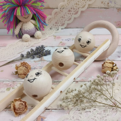 dall'alto e frontale 25 mm faccine testine legno dipinte disegnate stampate occhietti sorridenti ad uso angioletti bambole di pezza visetti fai da te creativo pigotte di stoffa tessuto Natale balocchi natalizi albero bamboline pasquali pupazzi bomboniere