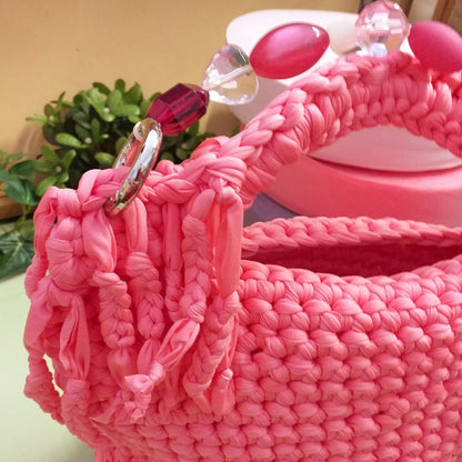 aggancio laterale borsa lycra fettuccia uncinetto pochette con frange cerimonia matrimonio da giorno da sera maniglia manico gioiello perle pietre catena metallo colori rosa cipria fucsia glicine lilla