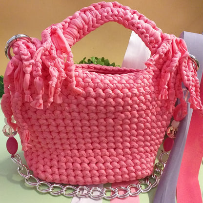 lato anteriore borsa lycra fettuccia uncinetto pochette con frange cerimonia matrimonio da giorno da sera maniglia manico gioiello perle pietre catena metallo colori rosa cipria fucsia glicine lilla