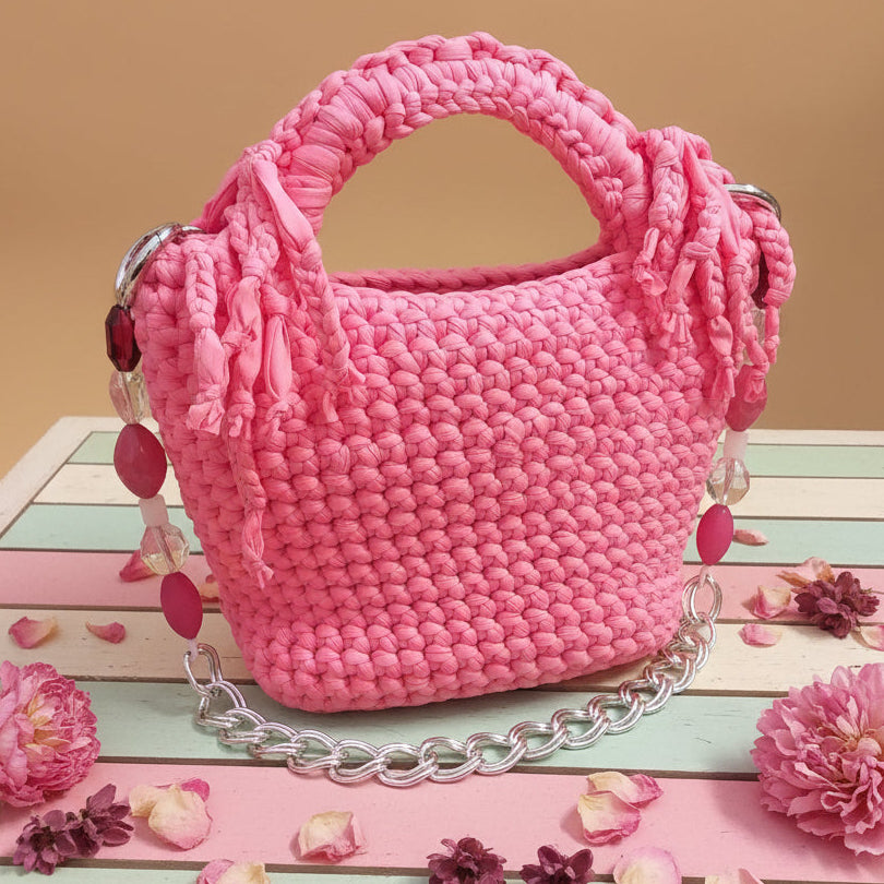 vetrina estiva mare borsa lycra fettuccia uncinetto pochette con frange cerimonia matrimonio da giorno da sera maniglia manico gioiello perle pietre catena metallo colori rosa cipria fucsia glicine lilla