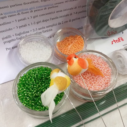 fiori di pesco salmone composizione pasquale colori  floreale kit conteria di vetro rocailles fai da te steli istruzione materiale occorrente filo zincato guttaperca stemtex adesivo nastro verde fioristi