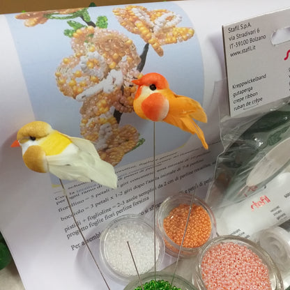 idea fiori di pesco salmone composizione floreale kit conteria di vetro rocailles fai da te steli istruzione materiale occorrente filo zincato guttaperca stemtex adesivo nastro verde fioristi