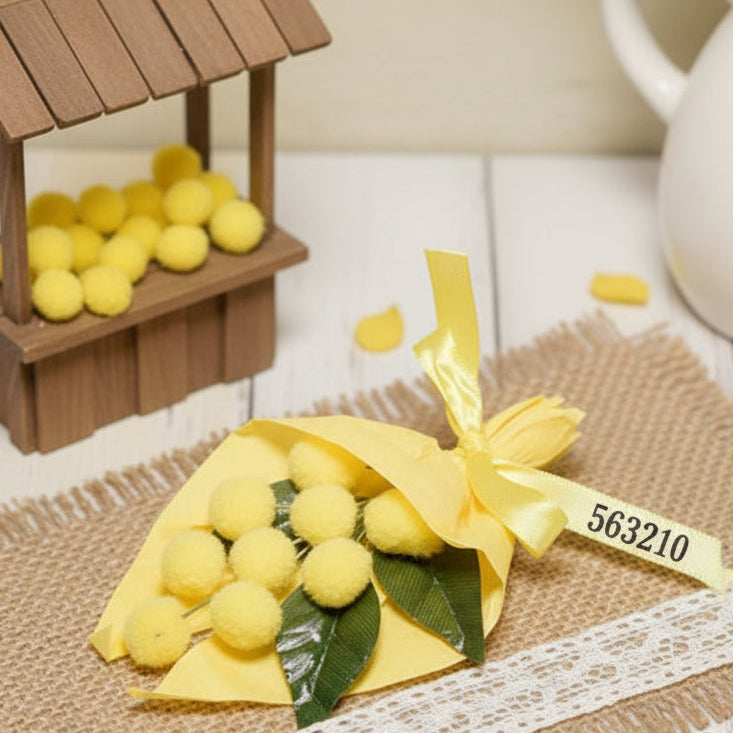 bouquet mazzolino incartato carta gialla mazzetti mimosa finta artificiale fiori gialli e 3 foglie palline ciniglia per fai da te confezionare regalini ricordini souvenir vetrinistica chiudipacco festa della donna 8 marzo 2026