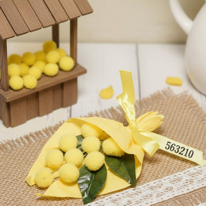 bouquet mazzolino incartato carta gialla mazzetti mimosa finta artificiale fiori gialli e 3 foglie palline ciniglia per fai da te confezionare regalini ricordini souvenir vetrinistica chiudipacco festa della donna 8 marzo 2026