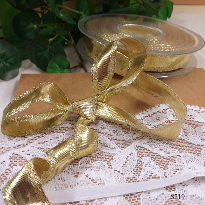 nastrino animato con ferretto lamè dorato colore oro nastro vetrina decorativo per bomboniere anniversario matrimonio nozze e decorazioni albero natale confezioni regalo pacchi packaging coccarde fiocchi