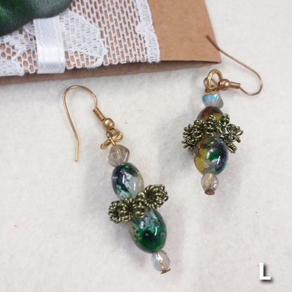 orecchini fatti a mano con pietre perline  di pendenti particolari intreccio perle offerte con cristalli swarovski verde e cristallo con monachelle