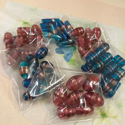 fucsia bordeaux e turchese oliva tubetto botte goccia perline grandi con brillantini di avventurina perle vetro bigiotteria stile veneziano murano a lume uso fai da te gioielli bijoux ciondolo collana