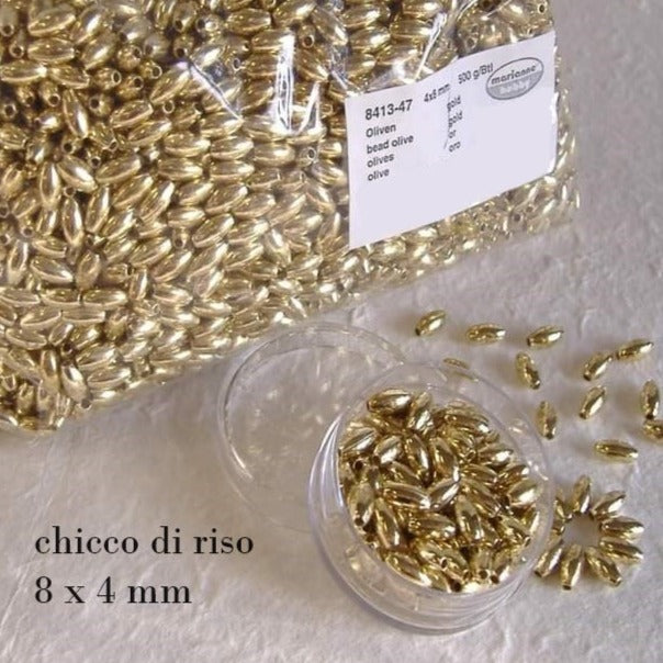 colore oro dorato shop vetrina perle ovali olive chicco di riso 8 x 4 mm uso fai da te gioielli di perline bijoux bigiotteria ricamo abbigliamento bomboniere tissage danese