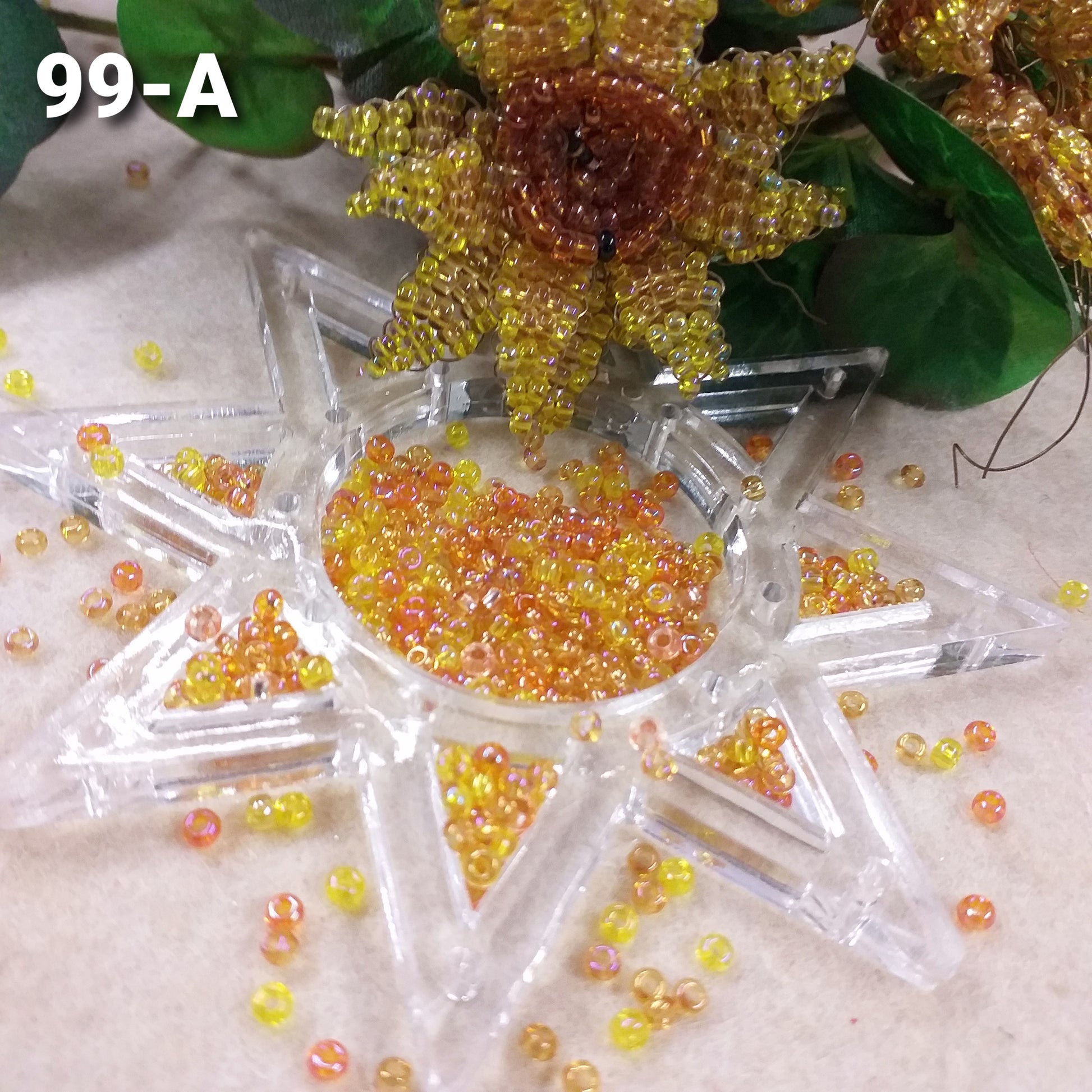 misto per girasoli di perline colori cangianti iridati iridescenti arcobaleno conteria veneziana vetro rocailles lavori creazioni fiori animaletti tessitura tissage danese