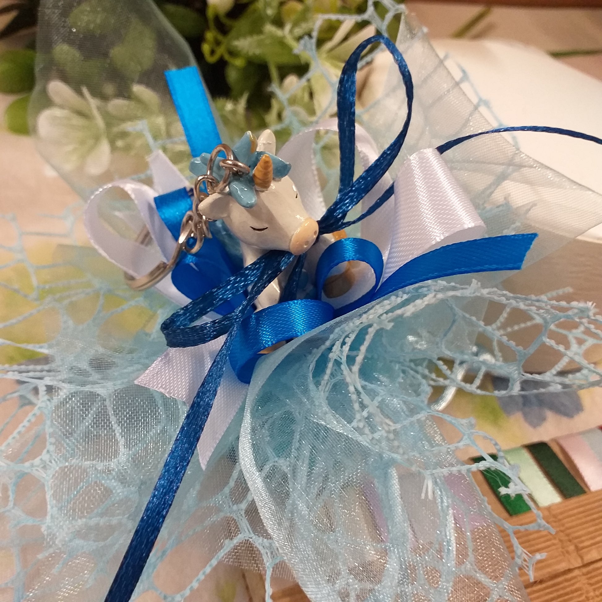 colori confezionamento unicorno portachiavi celeste sacchettino confetti primo compleanno bomboniere battesimo nascita portaconfetti