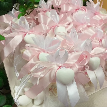 confettata con sacchetti bianchi nastro rosa gessetto cuore Italian bomboniere Prima Comunione Santa Cresima Battesimo nascita matrimonio laurea portaconfetti originali bigliettino stampato confezionati 5 confetti mandorla o cioccolato