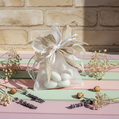 solitario sacchetto organza con grande fiocco coccarda rustica green shabby juta garza lino confezionato confetti matrimonio Prima Comunione Santa Cresima ambiente country fiori secchi grezzo naturale