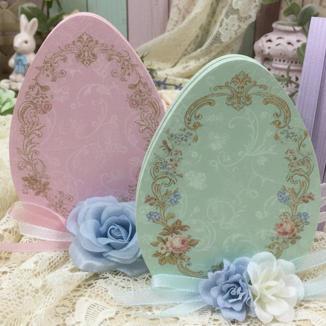vetrina allestimento uova piatte fette di legno sagome basi supporti sostegni per centrotavola fuoriporta da decorare decoupage pannolenci colorare dipingere per addobbi decorazioni pasquali fai da te con fiori botanica piante artificiali