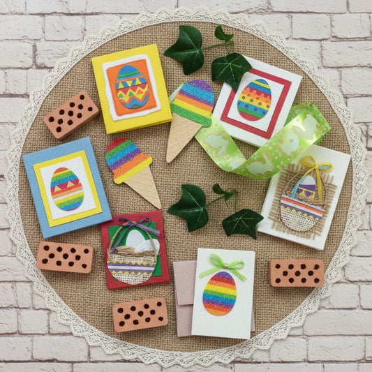 chiudipacco shop accessori packaging pasquale tema uova coniglietti fiori margherite bigliettini carta mano di riso gelso juta rafia bustina cartoncino paglia nastro verde coniglietti