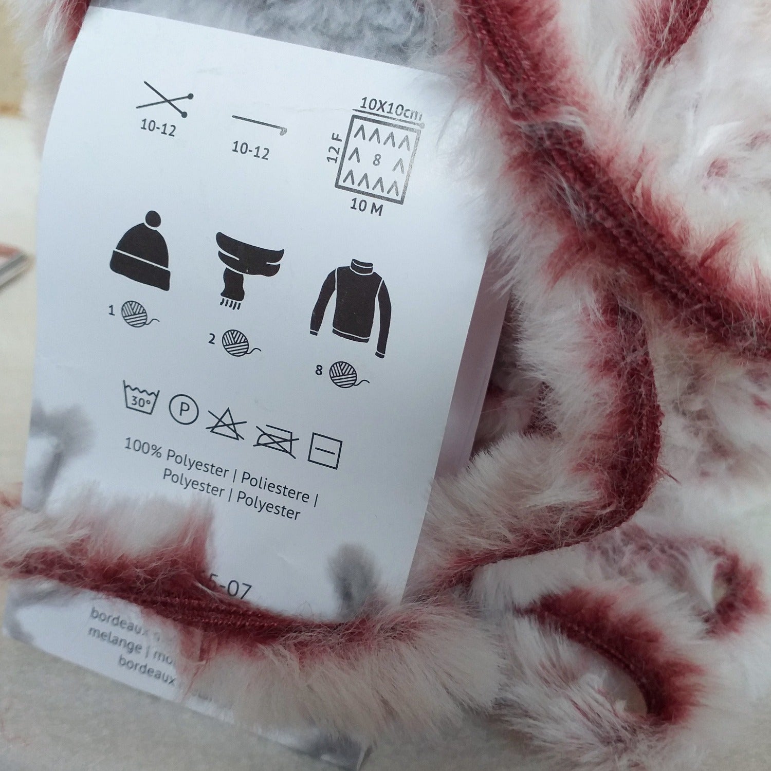 etichetta filato Stafil Cuddly 108065-07 bordeaux rosato melange lana pelliccia uncinetto lavori a maglia uso fare a mano cappello berretto 1 gomitolo, sciarpa 2 gomitoli, maglione 8 gomitoli con uncini 10-12 mattonella 10 cm 12 ferri verticali 10 maglie orizzontali