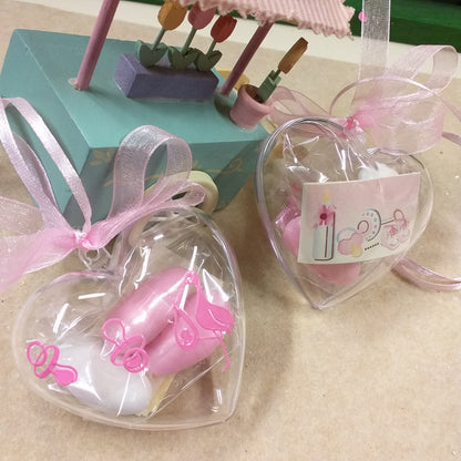 rosa pastello cicogna ciuccio scatoline portaconfetti cuoricini nascita Battesimo bimba femminuccia bomboniere babyshower e allestimento confettata aprifesta confezionate confetti bigliettino biberon