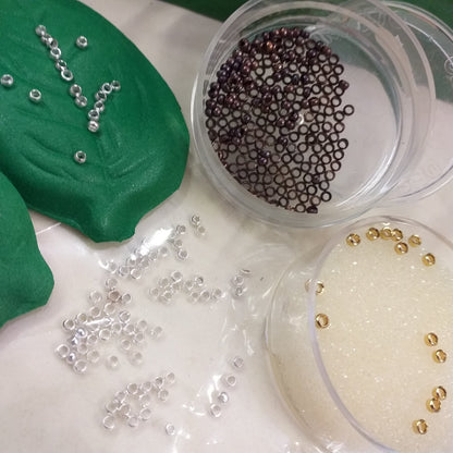 idee e negozio schiaccini fermini per collane bigiotteria componenti accessori perle di metallo chiusura gioielli perline uso minuteria bracciali